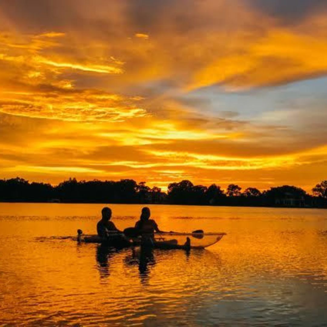 kayaking on the lake at sunset kayaking on the lake at sunset